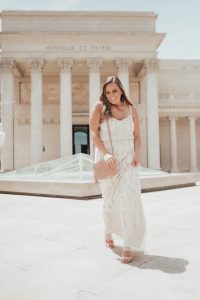 Ashley Zeal from Two Peas in a Prada partners with eBay bridal to share how to keep your bridesmaids on a budget! She is wearing Adrianna Papelll.