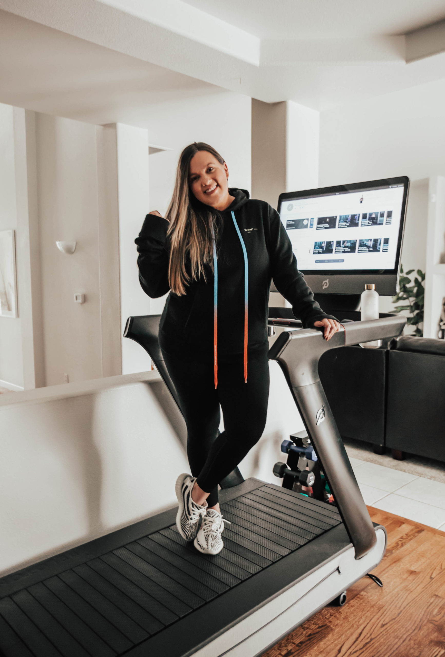 Reno blogger, Ashley Zeal Hurd from the Ashley and Emily Blog shares her Peloton Tread Review after having it for a year!