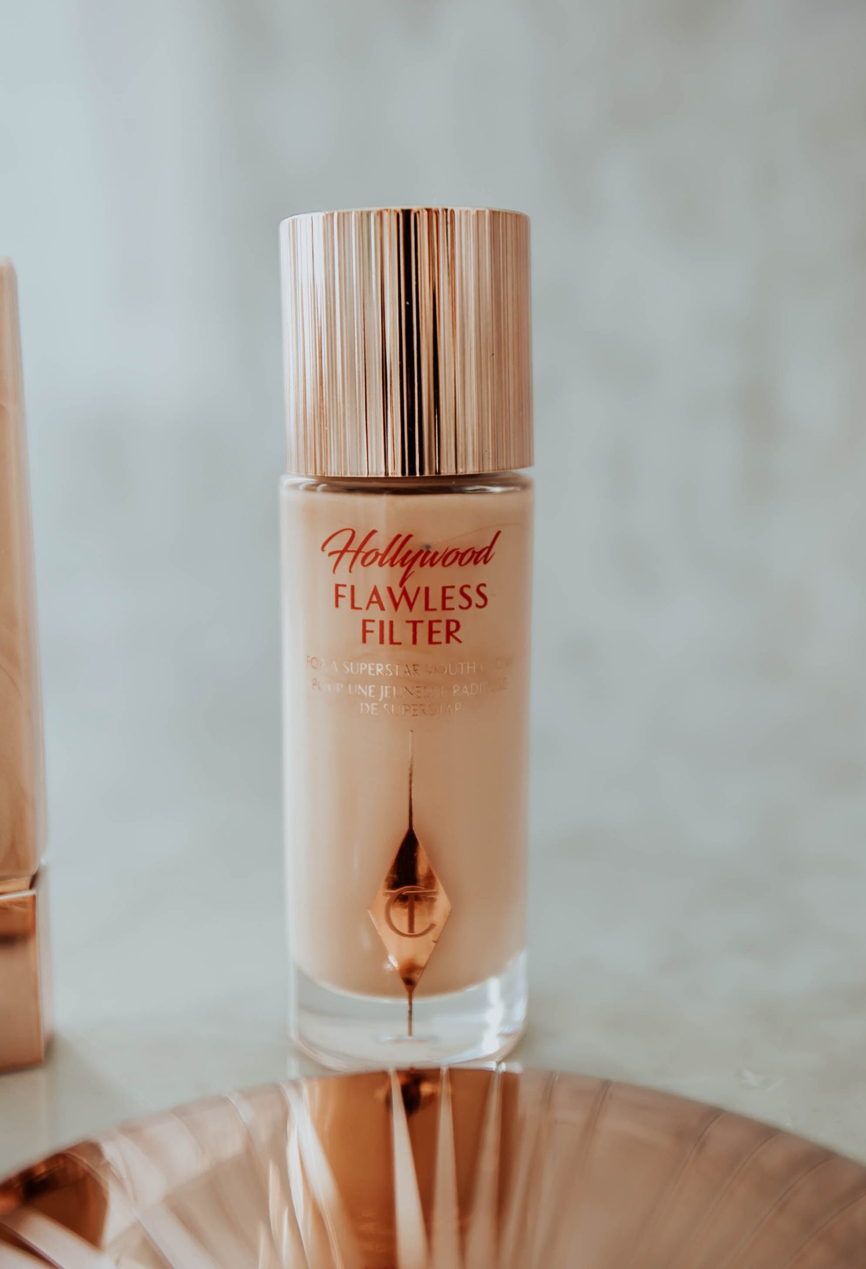 Ash and Em co founder Emily Farren Wieczorek talks about her new steps for flawless holiday skin - Charlotte Tilbury's Flawless Filter. 
