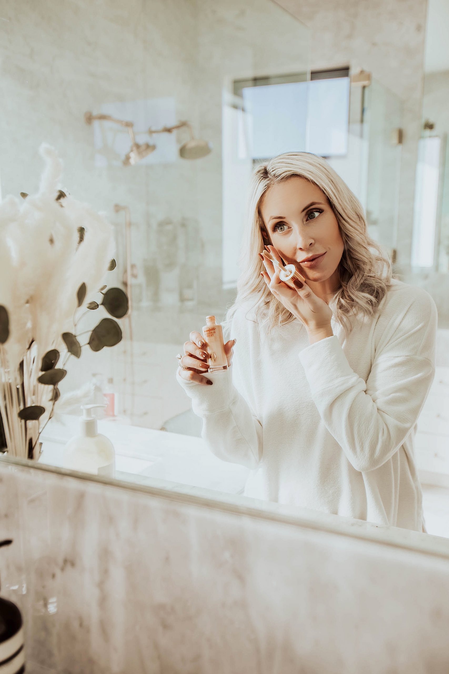 Ash and Em co founder Emily Farren Wieczorek talks about her new steps for flawless holiday skin - Charlotte Tilbury's Flawless Filter. 