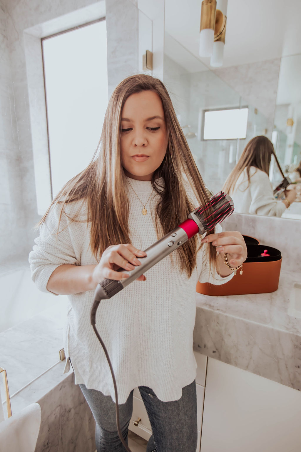 Reno blogger, Ashley Zeal Hurd, from the Ashley and Emily blog shares her Dyson Air Wrap Review and if it's worth it. 